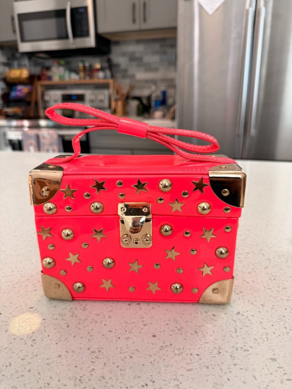 Betsey Johnson Red Don't Box Me In studded trunk